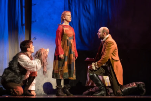 Lily Cascun on stage performing in The Grinning Man